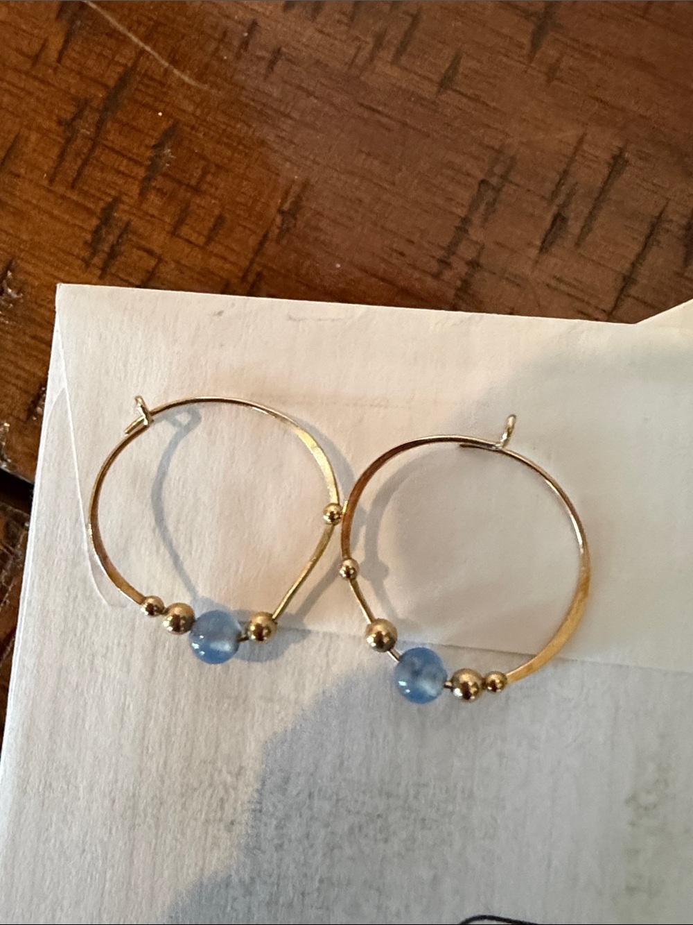 Gold Hoop Earrings with Blue Bead Accents